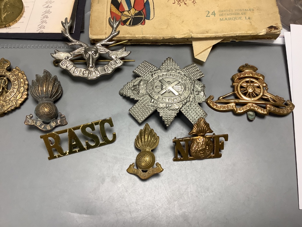 A group of assorted WW1 medals and badges etc